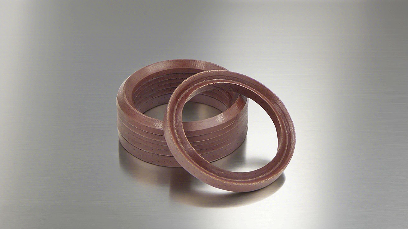 氟橡膠V型夾布油封---是由氟橡膠（FKM）+夾布密封材料制成的油封，主要應(yīng)用于盾構(gòu)機(jī)、冶金設(shè)備、陶瓷設(shè)備、重載油缸、油壓機(jī)等