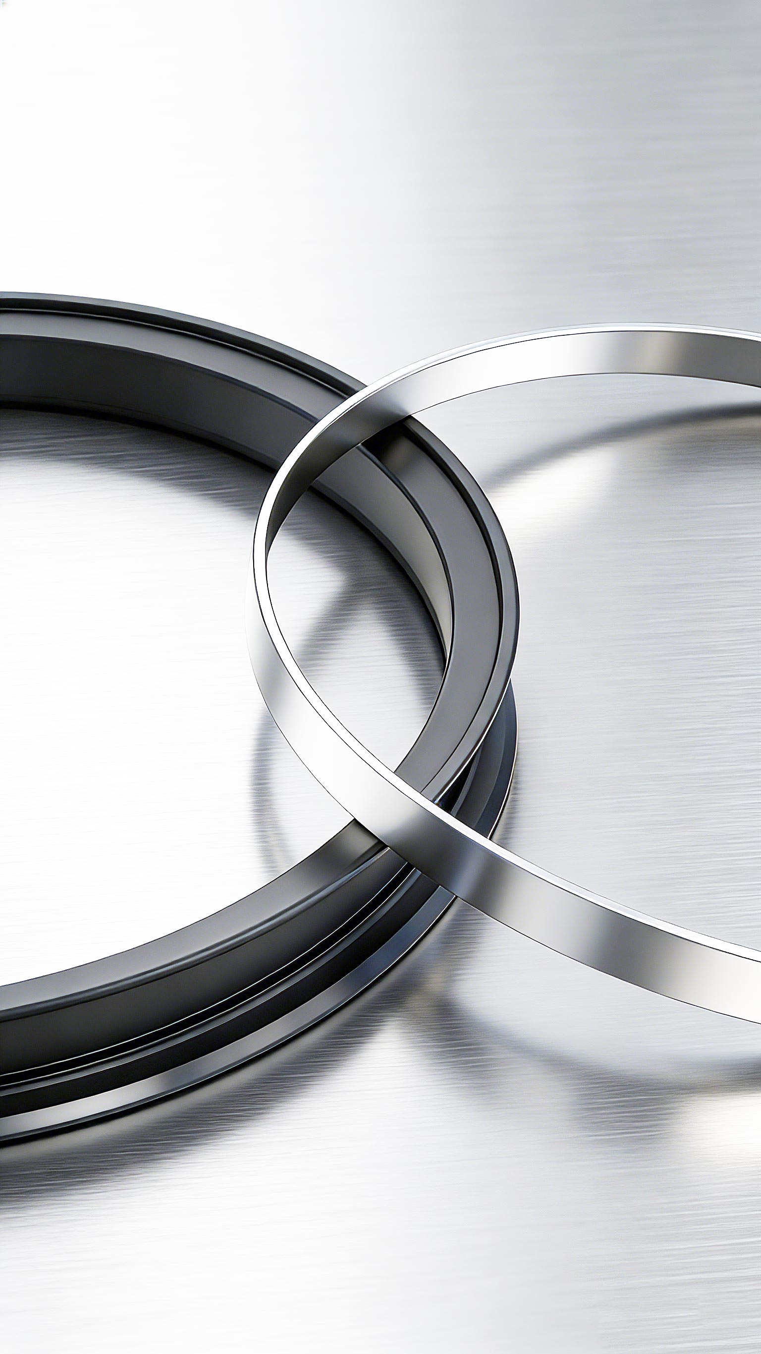 軋機(jī)速度超90米/秒，什么高線軋機(jī)密封件能扛??？ 高溫水汽油混合，密封易壞？選對(duì)高線軋機(jī)密封件？ 頻繁停機(jī)換密封？長(zhǎng)效型高線軋機(jī)密封件是關(guān)鍵? 在高速線材生產(chǎn)線上，軋輥軸承座的活塞桿正以90-100米/秒的驚人速度往復(fù)運(yùn)動(dòng)，這比高鐵速度還要快。在如此極端的高速摩擦下，普通橡膠密封件會(huì)迅速產(chǎn)生高溫，材料軟化磨損，通常數(shù)日內(nèi)即告失效，導(dǎo)致潤(rùn)滑油泄漏、冷卻水侵入。這直接造成軸承潤(rùn)滑不良，溫度飆升，最終引發(fā)昂貴的軸承燒毀事故，每次非計(jì)劃停機(jī)更換都意味著巨大的產(chǎn)量損失。專為這一嚴(yán)苛工況設(shè)計(jì)的高線軋機(jī)密封件，其核心采用了具有極低摩擦系數(shù)的聚四氟乙烯（PTFE）作為密封唇材料，輔以不銹鋼骨架提供強(qiáng)力支撐，從而在超高速度下仍能保持穩(wěn)定的密封性能和超長(zhǎng)使用壽命，是應(yīng)對(duì)高速挑戰(zhàn)的根本解決方案。  高溫蒸汽與冷卻水交織，密封件如何在“冰火兩重天”中不失效？ 高線軋機(jī)軸承座的工作環(huán)境異常復(fù)雜：內(nèi)部是超過110℃的高溫潤(rùn)滑油，外部則充斥著用于冷卻的軋制水和隨之產(chǎn)生的高溫水蒸氣。這種高溫、水汽與潤(rùn)滑油共存的惡劣工況，要求密封件材料必須同時(shí)具備卓越的耐高溫性、抗介質(zhì)性和尺寸穩(wěn)定性。傳統(tǒng)的丁腈橡膠（NBR）在此環(huán)境下極易硬化老化。而高線軋機(jī)密封件所使用的PTFE復(fù)合材料，天生憎水且化學(xué)性質(zhì)極其穩(wěn)定，能夠長(zhǎng)期耐受潤(rùn)滑油、水和蒸汽的混合侵蝕，在高溫下也不會(huì)發(fā)生顯著變形，確保密封界面始終嚴(yán)密，有效隔絕外部水汽侵入內(nèi)部油腔。  頻繁停機(jī)更換密封件，如何保障連續(xù)生產(chǎn)的效率和效益？ 對(duì)于追求連續(xù)化、高效率的現(xiàn)代化軋鋼生產(chǎn)線而言，設(shè)備可靠性就是生命線。軸承座密封的頻繁失效，導(dǎo)致的不僅僅是密封件本身的更換成本，更會(huì)連鎖引發(fā)軸承損壞、計(jì)劃外停機(jī)和寶貴的生產(chǎn)時(shí)間損失。一次計(jì)劃外停機(jī)可能造成每小時(shí)數(shù)萬元的產(chǎn)值損失。因此，選擇一款可靠的高線軋機(jī)密封件，實(shí)質(zhì)上是投資于整個(gè)生產(chǎn)線的穩(wěn)定性和綜合效益。它通過優(yōu)異的耐磨性和抗介質(zhì)能力，將維護(hù)周期從“按天計(jì)算”延長(zhǎng)至“按年計(jì)劃”，大幅提升了設(shè)備的平均無故障運(yùn)行時(shí)間。許多專注于工業(yè)密封領(lǐng)域的廣東密封件廠家，正是通過提供此類高性能定制化產(chǎn)品來幫助客戶實(shí)現(xiàn)降本增效。  國(guó)產(chǎn)高性能密封解決方案，助力中國(guó)制造業(yè)升級(jí)。 面對(duì)高速線材生產(chǎn)線對(duì)密封件越來越苛刻的要求，國(guó)內(nèi)密封行業(yè)正在積極迎戰(zhàn)。本土制造商不僅需要提供高質(zhì)量的產(chǎn)品，更需要對(duì)軋鋼工藝有深入的理解，才能設(shè)計(jì)出真正貼合工況的密封方案。一些技術(shù)領(lǐng)先的廣東密封件廠家已經(jīng)在此領(lǐng)域積累了豐富的經(jīng)驗(yàn)。例如，廣東東晟密封件廠家等企業(yè)，能夠針對(duì)不同軋機(jī)型號(hào)和具體工況，提供從材料配方、結(jié)構(gòu)設(shè)計(jì)到安裝指導(dǎo)的全套解決方案。國(guó)產(chǎn)高性能高線軋機(jī)密封件的成熟與應(yīng)用，正在逐步打破國(guó)外品牌在此領(lǐng)域的壟斷，以可靠的性能和更優(yōu)的性價(jià)比，為中國(guó)制造業(yè)的裝備升級(jí)與成本控制提供有力支撐。  一、性能測(cè)試標(biāo)準(zhǔn) GB/T 32217-2015《#液壓傳動(dòng)密封裝置評(píng)定液壓往復(fù)運(yùn)動(dòng)密封件性能的試驗(yàn)方法》 現(xiàn)行國(guó)家標(biāo)準(zhǔn)，專門用于評(píng)定往復(fù)運(yùn)動(dòng)密封件的性能。 為您文章中所有關(guān)于密封性能、可靠性的論述提供了國(guó)家標(biāo)準(zhǔn)級(jí)的、可驗(yàn)證的測(cè)試方法依據(jù)。   二、行業(yè)應(yīng)用與改造案例 《#高線軋機(jī)初中軋軸承座密封系統(tǒng)改造》（《#潤(rùn)滑與密封》） 行業(yè)核心期刊文章，分析了與您文中描述完全一致的實(shí)際工況問題。