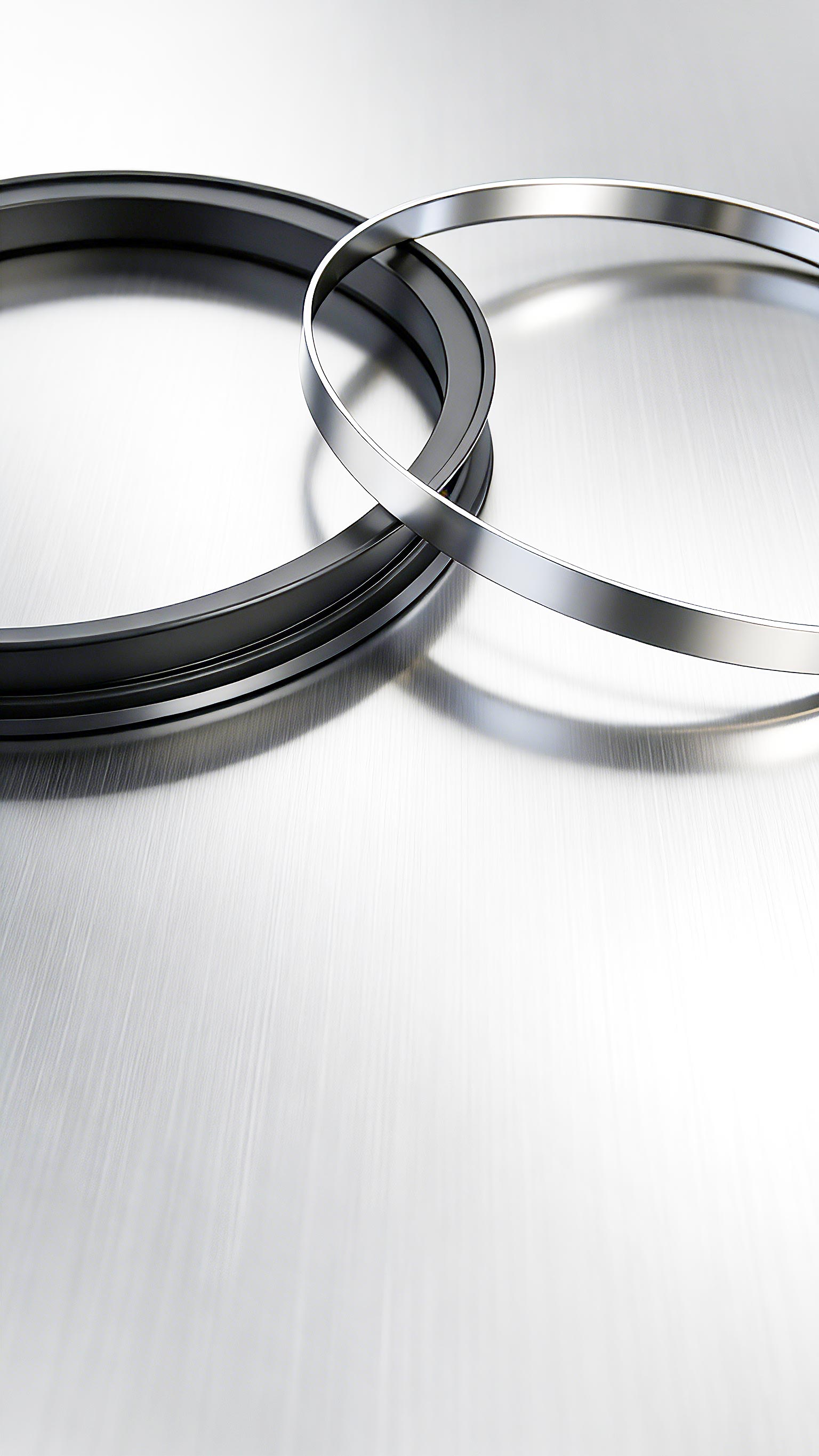 軋機(jī)速度超90米/秒，什么高線軋機(jī)密封件能扛?。?高溫水汽油混合，密封易壞？選對(duì)高線軋機(jī)密封件？ 頻繁停機(jī)換密封？長(zhǎng)效型高線軋機(jī)密封件是關(guān)鍵? 在高速線材生產(chǎn)線上，軋輥軸承座的活塞桿正以90-100米/秒的驚人速度往復(fù)運(yùn)動(dòng)，這比高鐵速度還要快。在如此極端的高速摩擦下，普通橡膠密封件會(huì)迅速產(chǎn)生高溫，材料軟化磨損，通常數(shù)日內(nèi)即告失效，導(dǎo)致潤(rùn)滑油泄漏、冷卻水侵入。這直接造成軸承潤(rùn)滑不良，溫度飆升，最終引發(fā)昂貴的軸承燒毀事故，每次非計(jì)劃停機(jī)更換都意味著巨大的產(chǎn)量損失。專為這一嚴(yán)苛工況設(shè)計(jì)的高線軋機(jī)密封件，其核心采用了具有極低摩擦系數(shù)的聚四氟乙烯（PTFE）作為密封唇材料，輔以不銹鋼骨架提供強(qiáng)力支撐，從而在超高速度下仍能保持穩(wěn)定的密封性能和超長(zhǎng)使用壽命，是應(yīng)對(duì)高速挑戰(zhàn)的根本解決方案。  高溫蒸汽與冷卻水交織，密封件如何在“冰火兩重天”中不失效？ 高線軋機(jī)軸承座的工作環(huán)境異常復(fù)雜：內(nèi)部是超過110℃的高溫潤(rùn)滑油，外部則充斥著用于冷卻的軋制水和隨之產(chǎn)生的高溫水蒸氣。這種高溫、水汽與潤(rùn)滑油共存的惡劣工況，要求密封件材料必須同時(shí)具備卓越的耐高溫性、抗介質(zhì)性和尺寸穩(wěn)定性。傳統(tǒng)的丁腈橡膠（NBR）在此環(huán)境下極易硬化老化。而高線軋機(jī)密封件所使用的PTFE復(fù)合材料，天生憎水且化學(xué)性質(zhì)極其穩(wěn)定，能夠長(zhǎng)期耐受潤(rùn)滑油、水和蒸汽的混合侵蝕，在高溫下也不會(huì)發(fā)生顯著變形，確保密封界面始終嚴(yán)密，有效隔絕外部水汽侵入內(nèi)部油腔。  頻繁停機(jī)更換密封件，如何保障連續(xù)生產(chǎn)的效率和效益？ 對(duì)于追求連續(xù)化、高效率的現(xiàn)代化軋鋼生產(chǎn)線而言，設(shè)備可靠性就是生命線。軸承座密封的頻繁失效，導(dǎo)致的不僅僅是密封件本身的更換成本，更會(huì)連鎖引發(fā)軸承損壞、計(jì)劃外停機(jī)和寶貴的生產(chǎn)時(shí)間損失。一次計(jì)劃外停機(jī)可能造成每小時(shí)數(shù)萬元的產(chǎn)值損失。因此，選擇一款可靠的高線軋機(jī)密封件，實(shí)質(zhì)上是投資于整個(gè)生產(chǎn)線的穩(wěn)定性和綜合效益。它通過優(yōu)異的耐磨性和抗介質(zhì)能力，將維護(hù)周期從“按天計(jì)算”延長(zhǎng)至“按年計(jì)劃”，大幅提升了設(shè)備的平均無故障運(yùn)行時(shí)間。許多專注于工業(yè)密封領(lǐng)域的廣東密封件廠家，正是通過提供此類高性能定制化產(chǎn)品來幫助客戶實(shí)現(xiàn)降本增效。  國(guó)產(chǎn)高性能密封解決方案，助力中國(guó)制造業(yè)升級(jí)。 面對(duì)高速線材生產(chǎn)線對(duì)密封件越來越苛刻的要求，國(guó)內(nèi)密封行業(yè)正在積極迎戰(zhàn)。本土制造商不僅需要提供高質(zhì)量的產(chǎn)品，更需要對(duì)軋鋼工藝有深入的理解，才能設(shè)計(jì)出真正貼合工況的密封方案。一些技術(shù)領(lǐng)先的廣東密封件廠家已經(jīng)在此領(lǐng)域積累了豐富的經(jīng)驗(yàn)。例如，廣東東晟密封件廠家等企業(yè)，能夠針對(duì)不同軋機(jī)型號(hào)和具體工況，提供從材料配方、結(jié)構(gòu)設(shè)計(jì)到安裝指導(dǎo)的全套解決方案。國(guó)產(chǎn)高性能高線軋機(jī)密封件的成熟與應(yīng)用，正在逐步打破國(guó)外品牌在此領(lǐng)域的壟斷，以可靠的性能和更優(yōu)的性價(jià)比，為中國(guó)制造業(yè)的裝備升級(jí)與成本控制提供有力支撐。  一、性能測(cè)試標(biāo)準(zhǔn) GB/T 32217-2015《#液壓傳動(dòng)密封裝置評(píng)定液壓往復(fù)運(yùn)動(dòng)密封件性能的試驗(yàn)方法》 現(xiàn)行國(guó)家標(biāo)準(zhǔn)，專門用于評(píng)定往復(fù)運(yùn)動(dòng)密封件的性能。 為您文章中所有關(guān)于密封性能、可靠性的論述提供了國(guó)家標(biāo)準(zhǔn)級(jí)的、可驗(yàn)證的測(cè)試方法依據(jù)。   二、行業(yè)應(yīng)用與改造案例 《#高線軋機(jī)初中軋軸承座密封系統(tǒng)改造》（《#潤(rùn)滑與密封》） 行業(yè)核心期刊文章，分析了與您文中描述完全一致的實(shí)際工況問題。